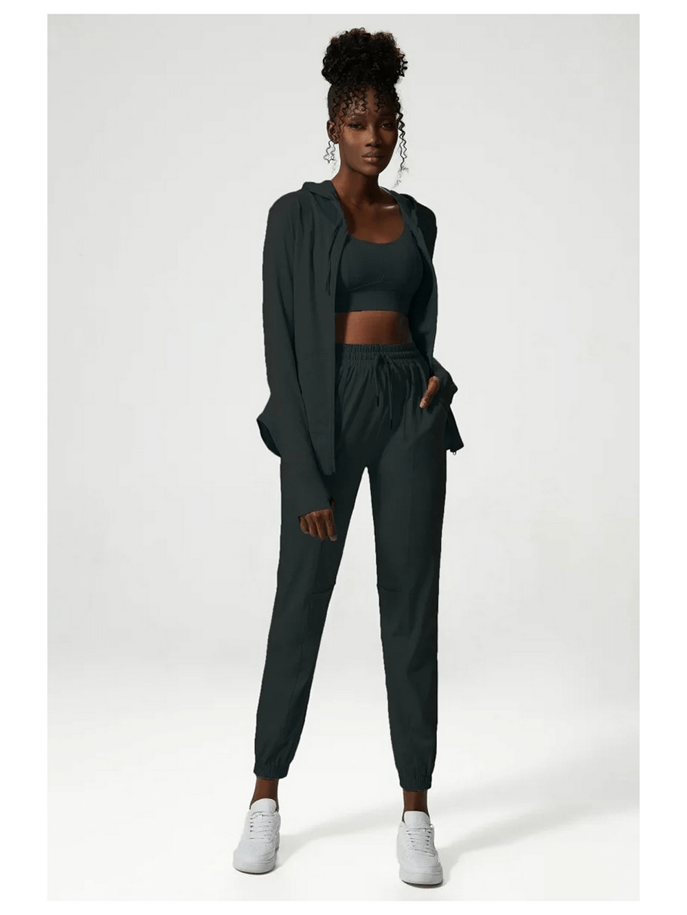 Woman wearing a stylish three-toned athletic clothing set SF2090, featuring breathable and quick-drying properties for active lifestyles.